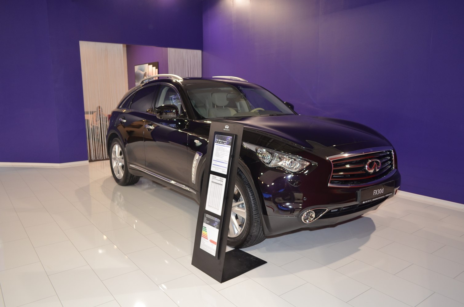Luxury SUV front and side view with distinctive grille and sleek design