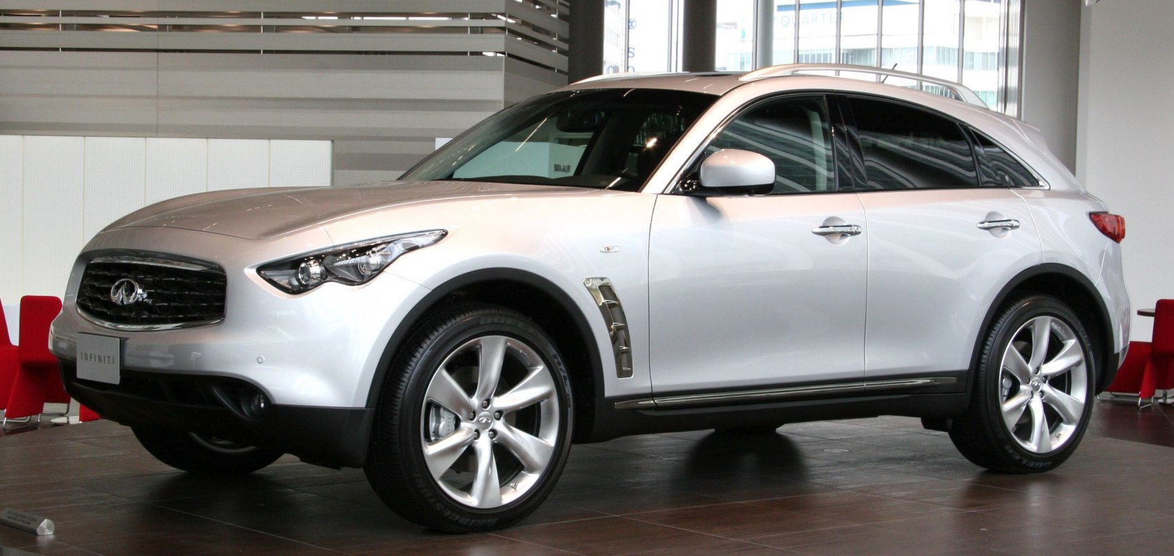 Luxury SUV with front grille and alloy wheels
