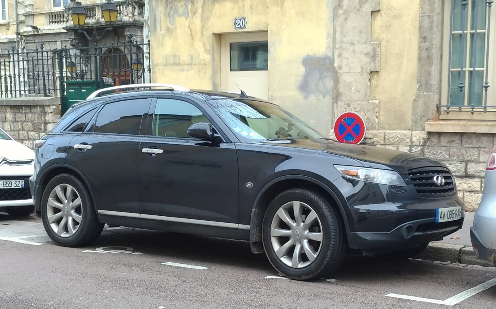 Black luxury SUV with aerodynamic side profile and alloy wheels