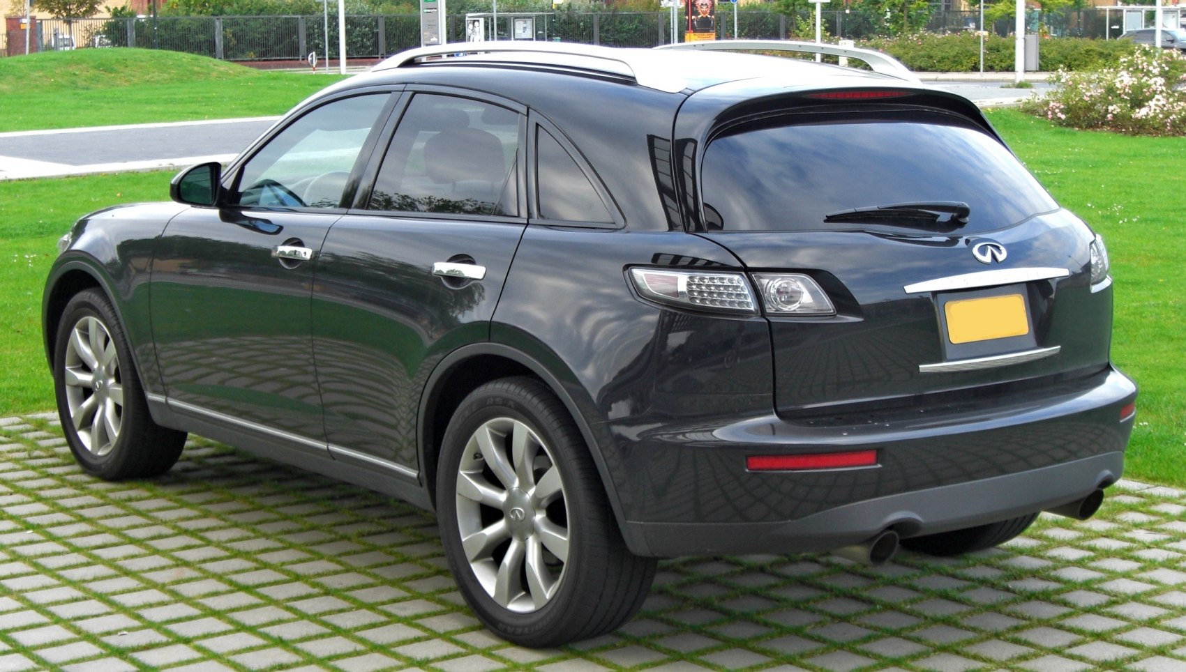 Rear side view with unique tail lights and alloy wheels