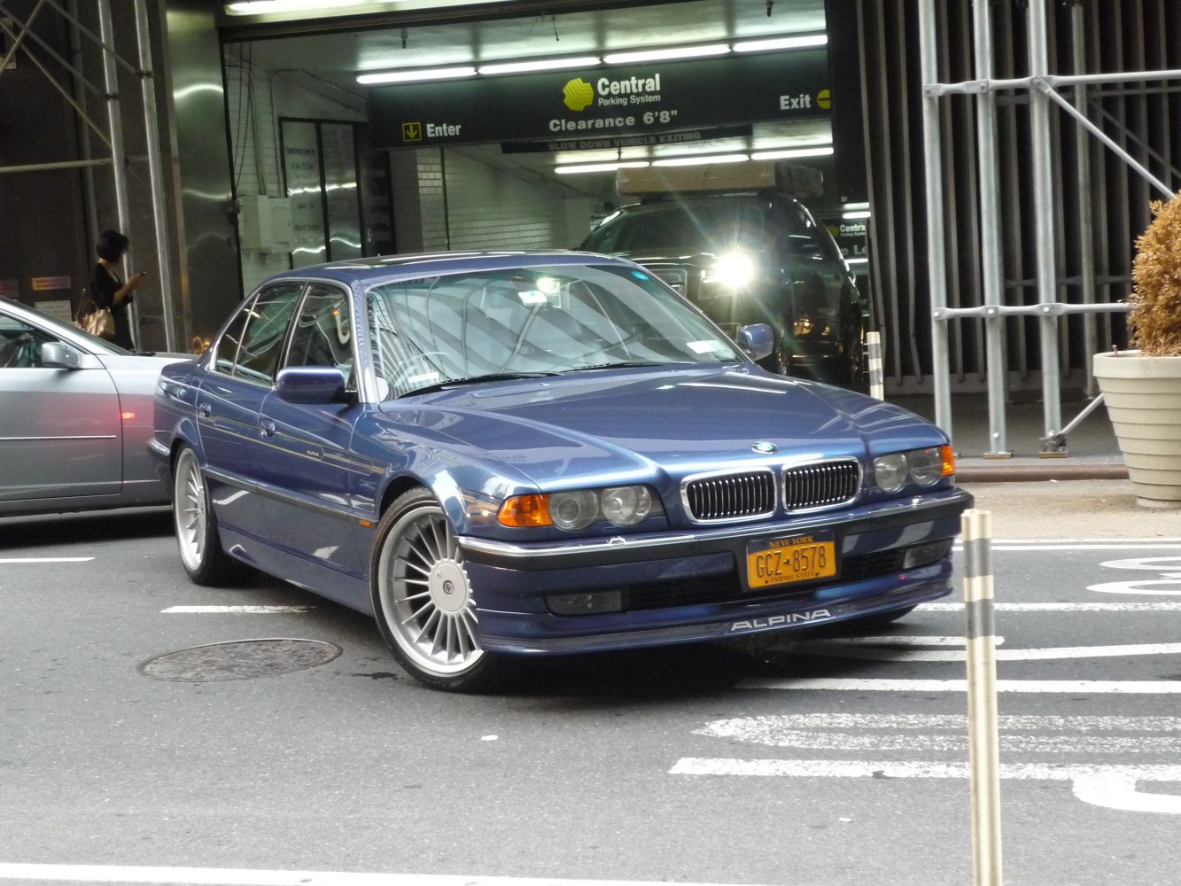 Luxury sedan with distinctive front grille and Alpina multi-spoke wheels