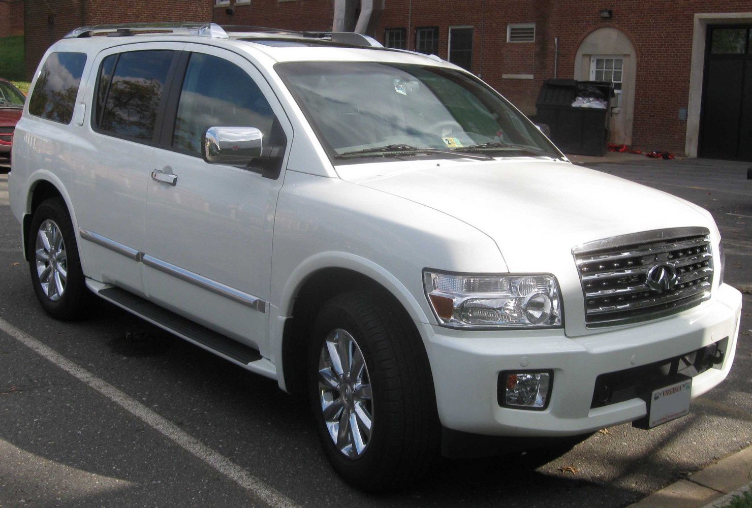 White large SUV with chrome grille and detailed headlights