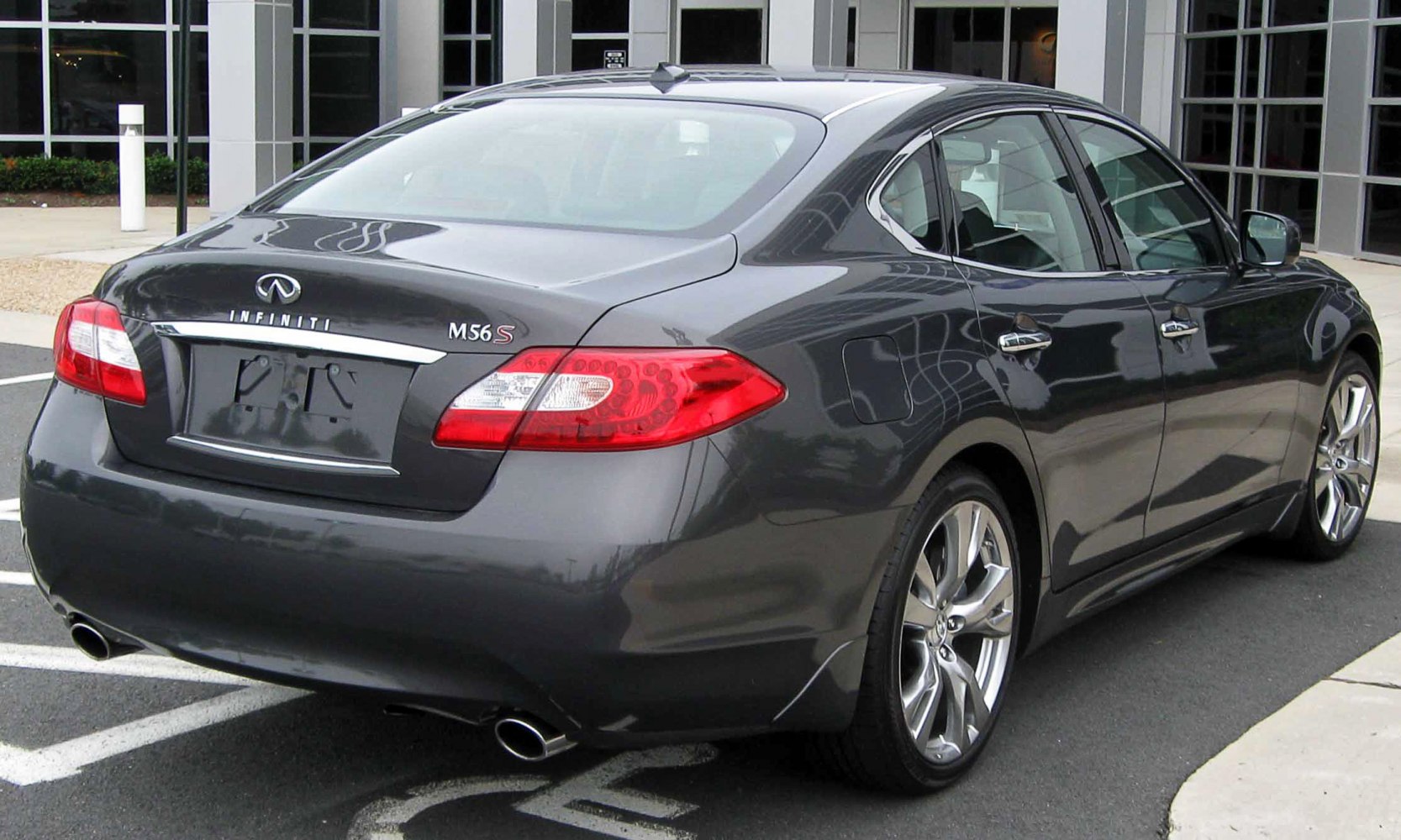 Rear angle view with dual exhaust and LED taillights