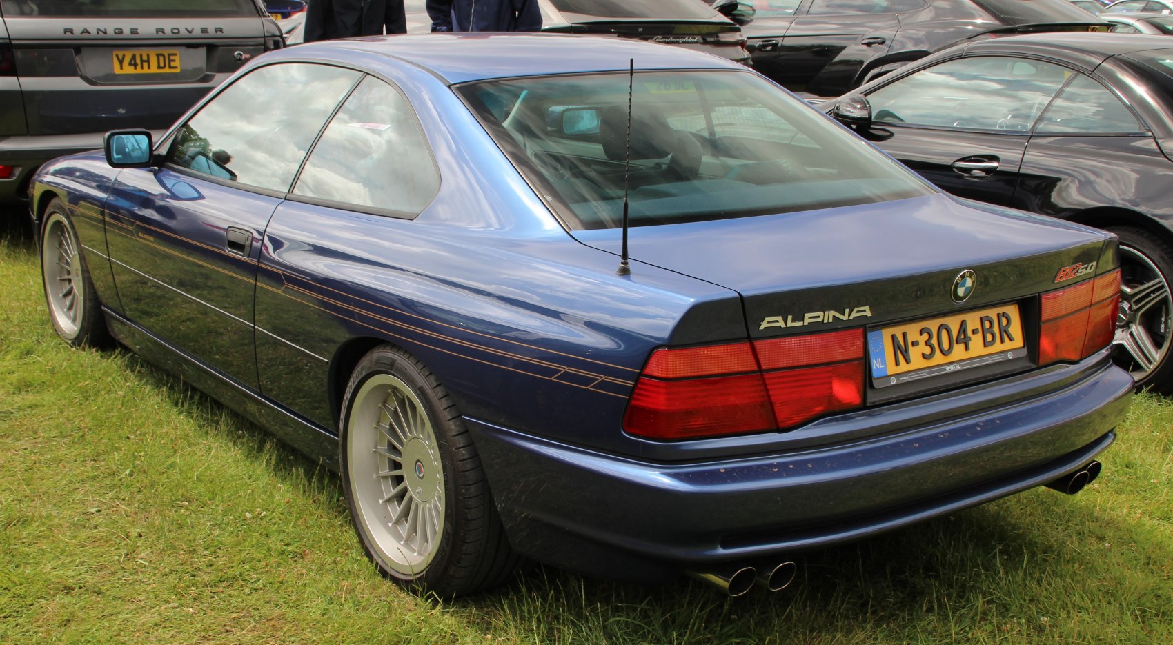 Rear and side view with classic Alpina wheels and dual exhaust