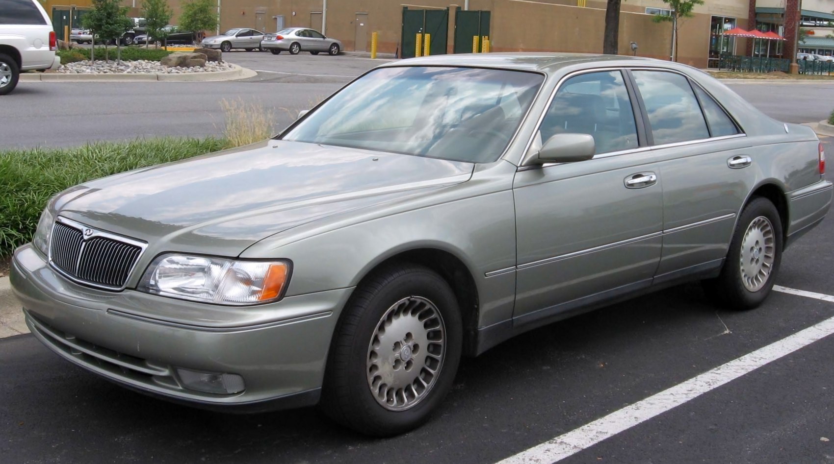 Luxury sedan with signature grille and alloy wheels front side view