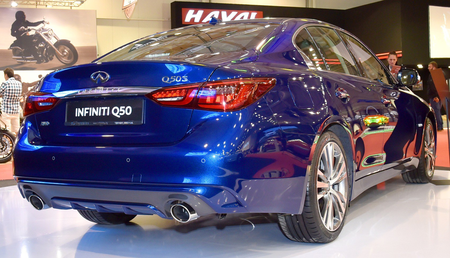 Rear view with dual exhausts and sporty alloy wheels