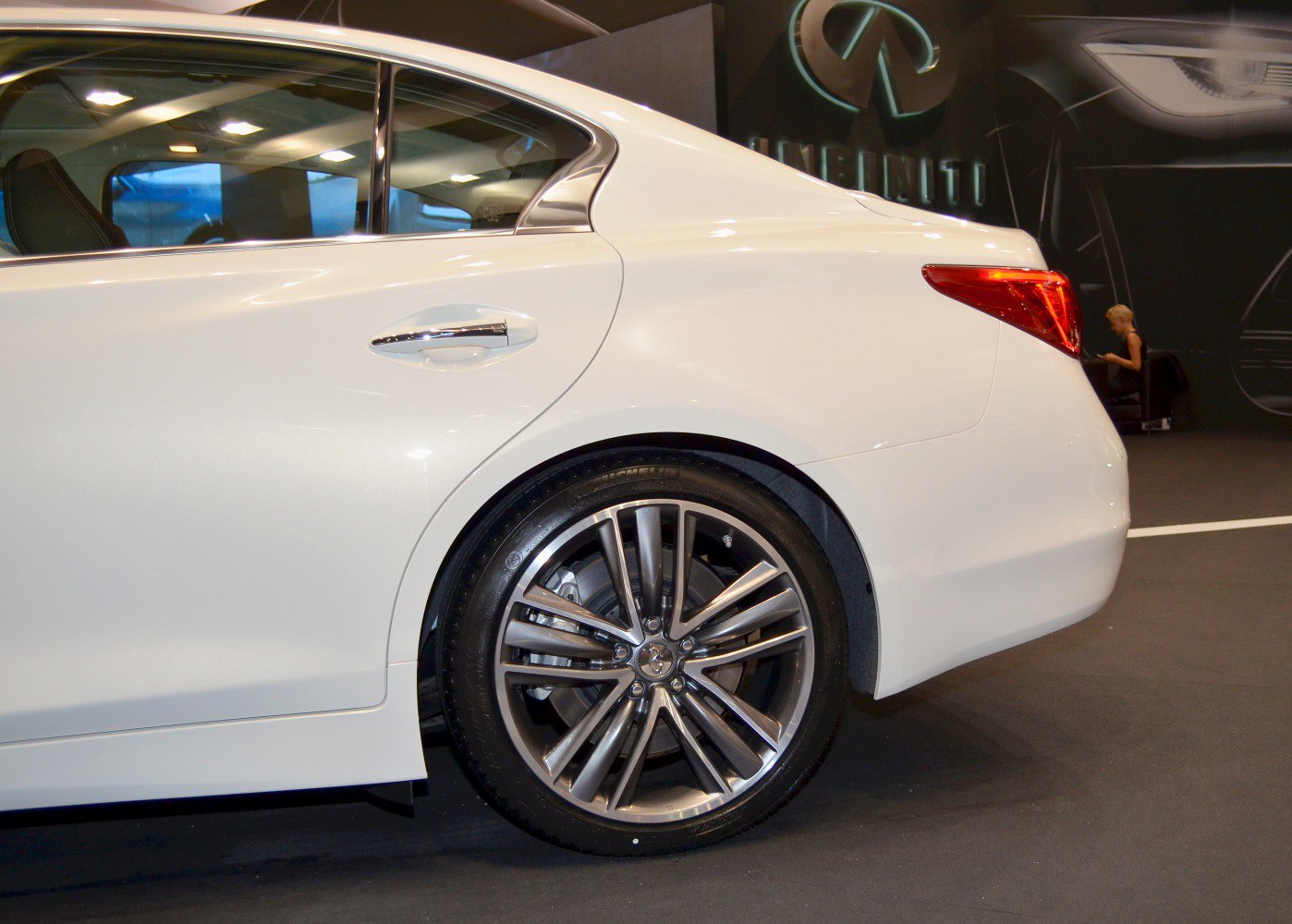 Rear quarter panel with alloy wheel and rear light cluster