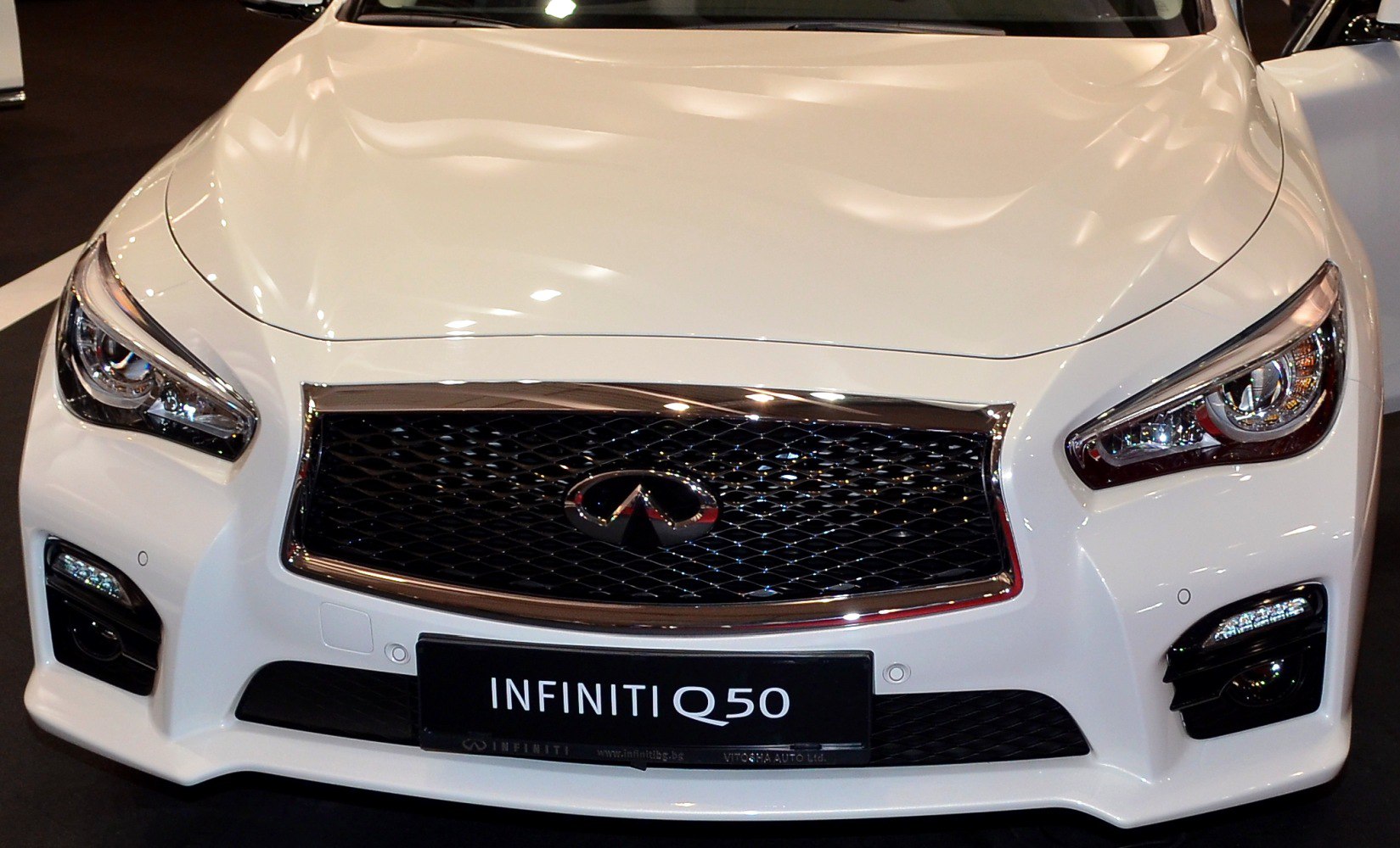 Close-up of front grille and headlights with chrome accents