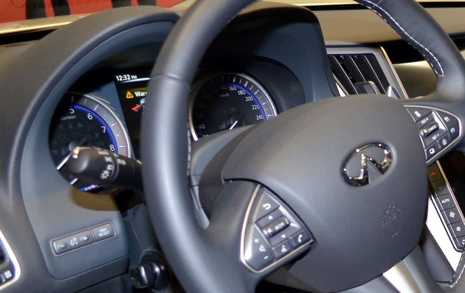 Instrument cluster and multifunction steering wheel controls