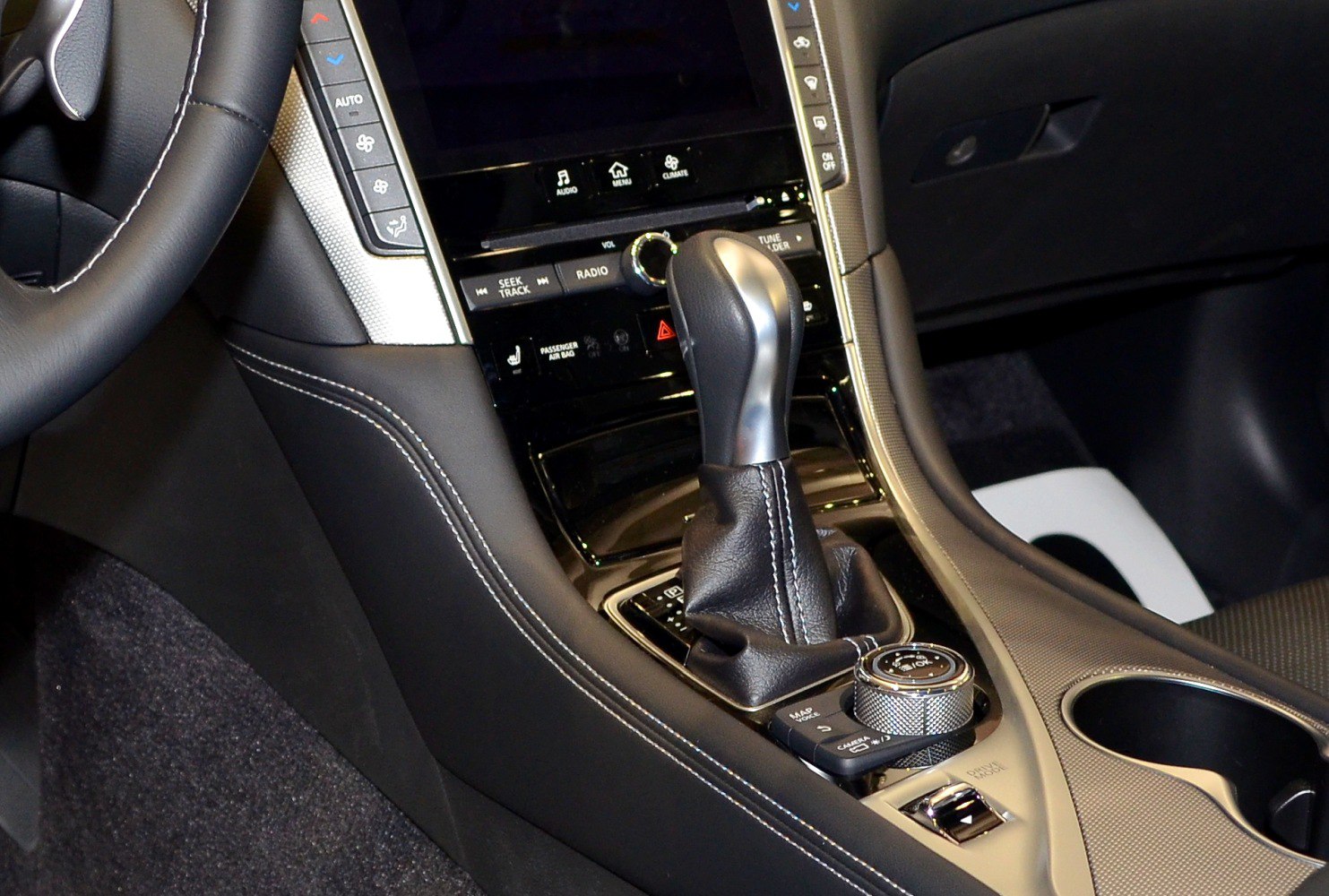 Gear shift lever and multimedia control knob in luxury car center console