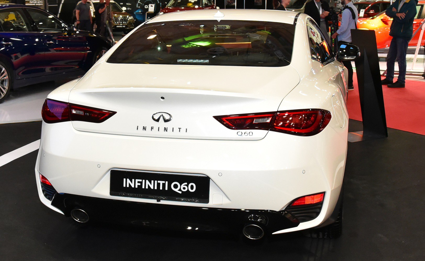 Sporty rear with sleek tail lights and dual exhaust outlets