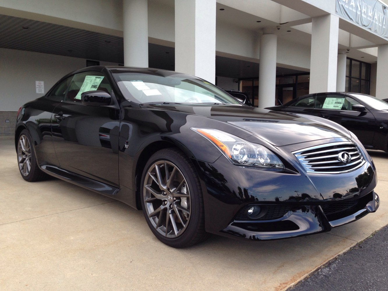 Front-side view highlighting headlight and alloy wheel design