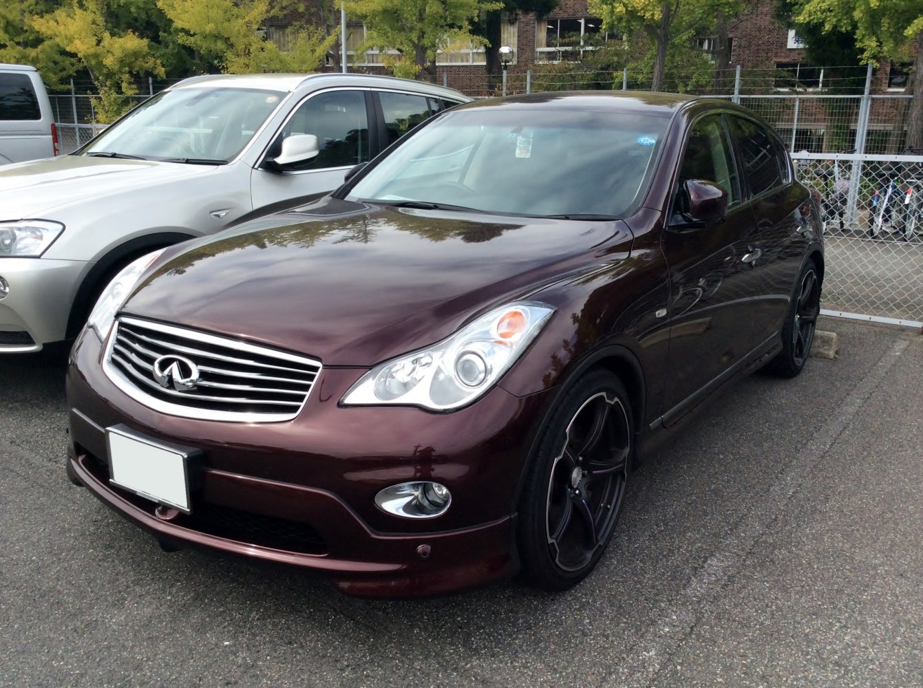 Front three-quarter view highlighting headlights and grille of an SUV
