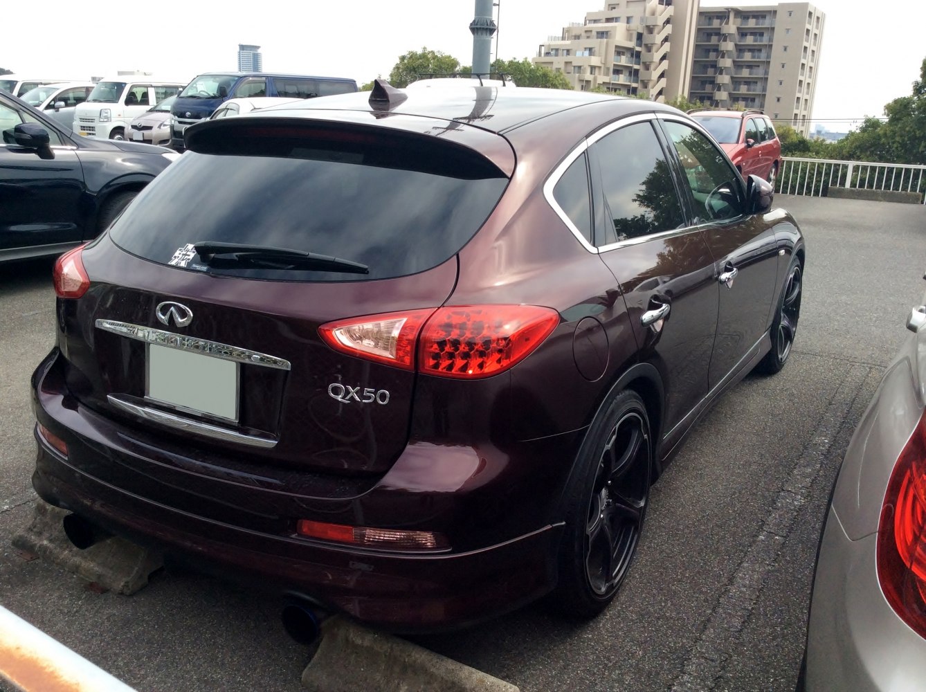 Rear view with LED taillights and black alloy wheels