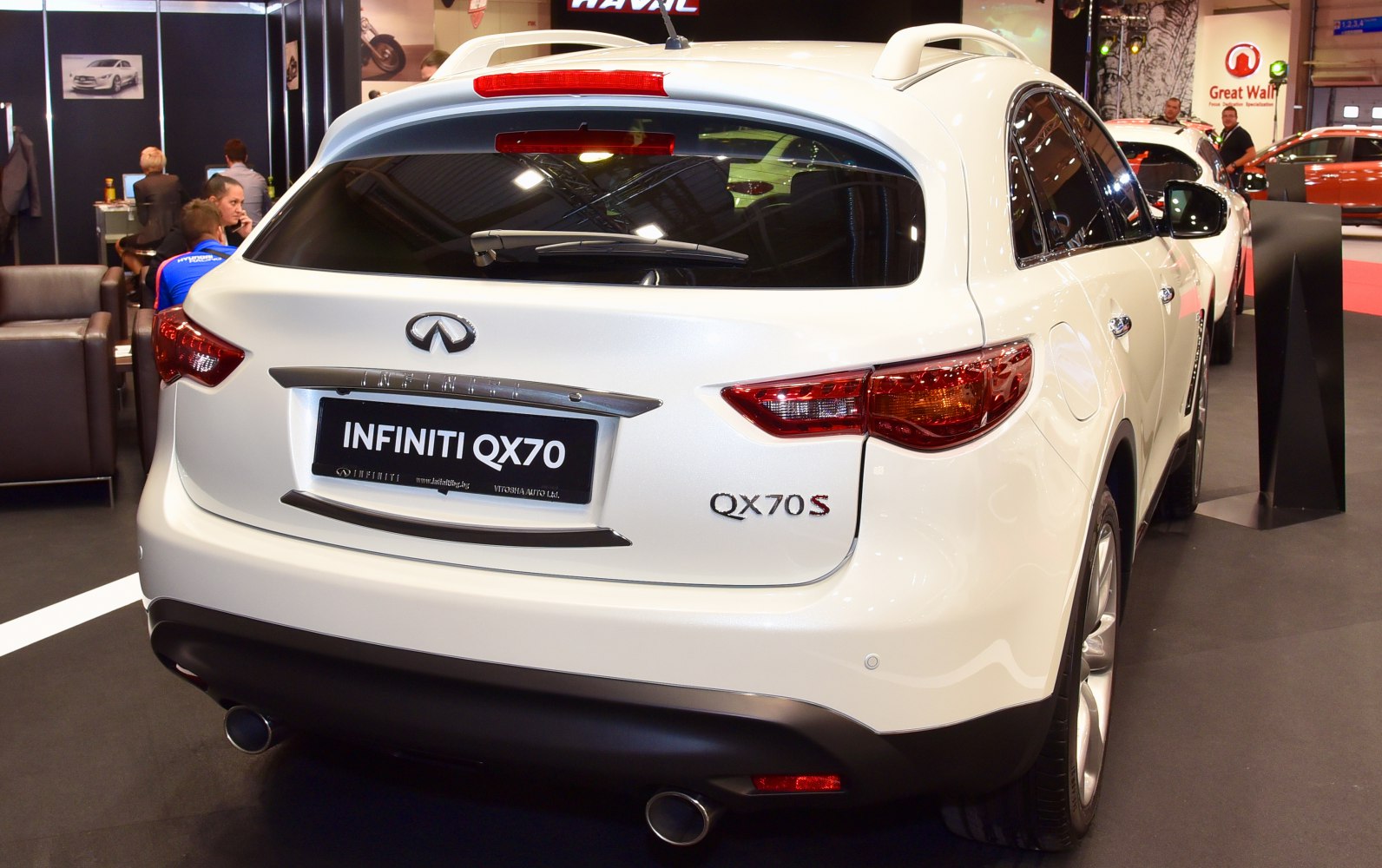 Rear view of a luxury SUV with dual exhaust and QX70S badge