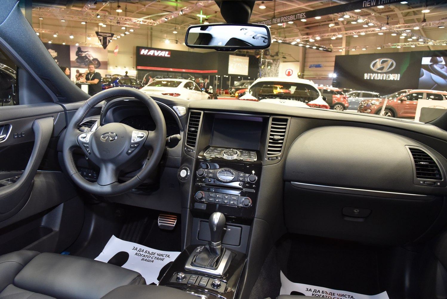 Interior dashboard and steering wheel with integrated controls