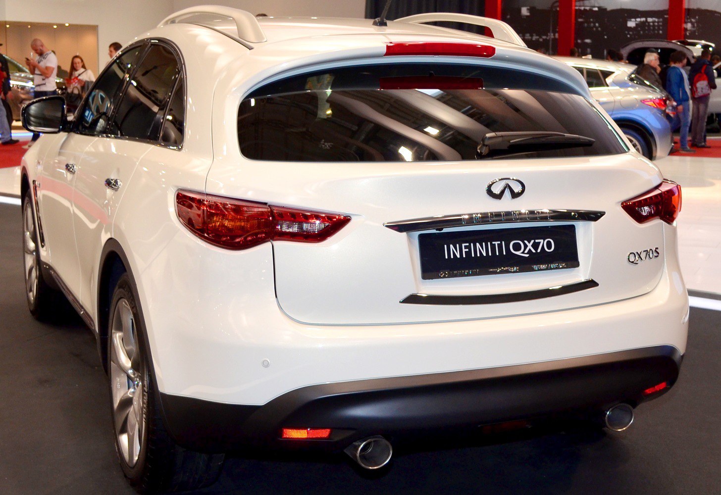 Rear design and tail lights of a white luxury SUV