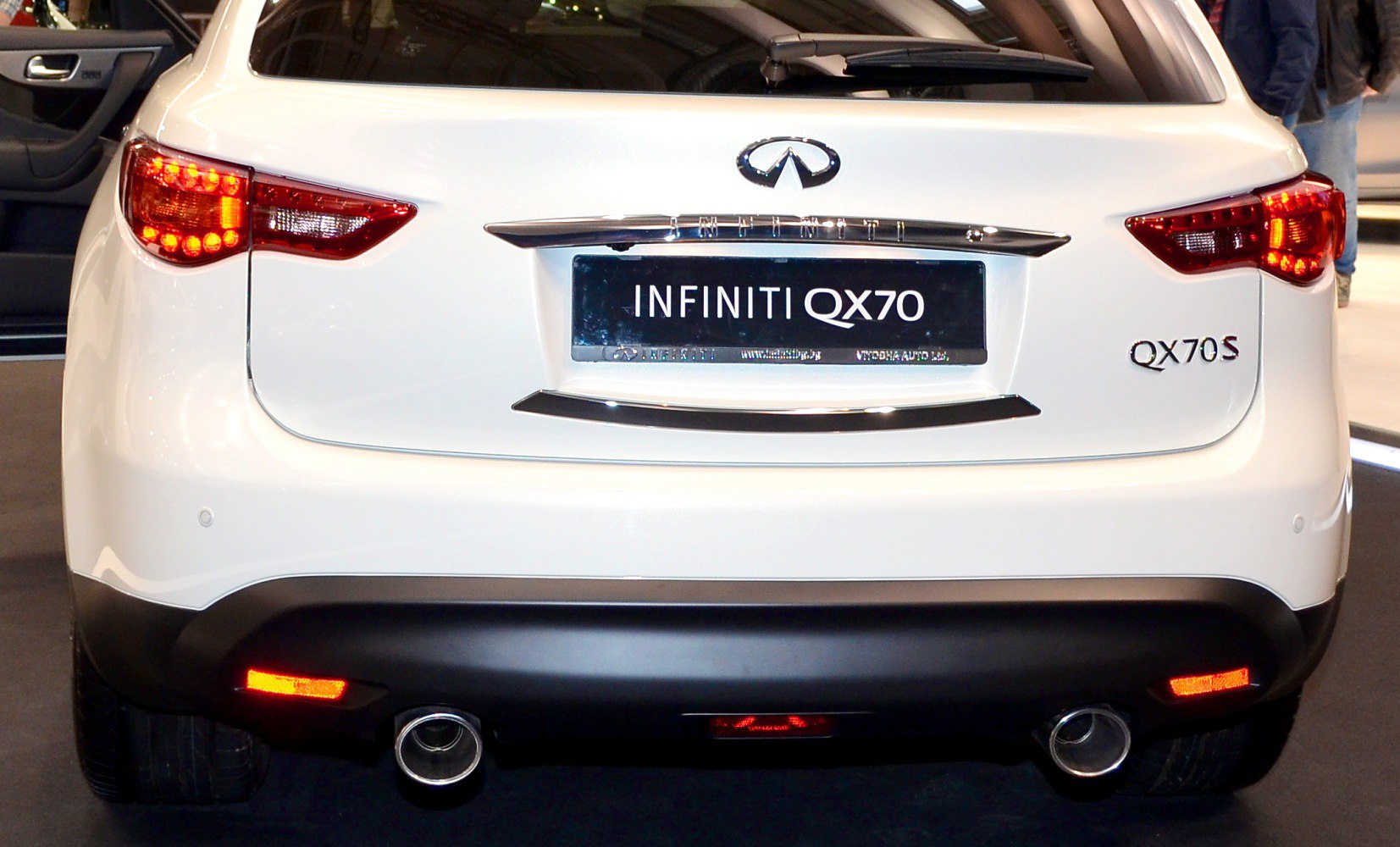 Rear view with LED tail lights and dual exhaust pipes