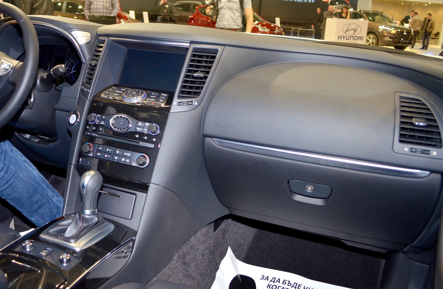 Modern dashboard with central control panel and automatic gear shift lever