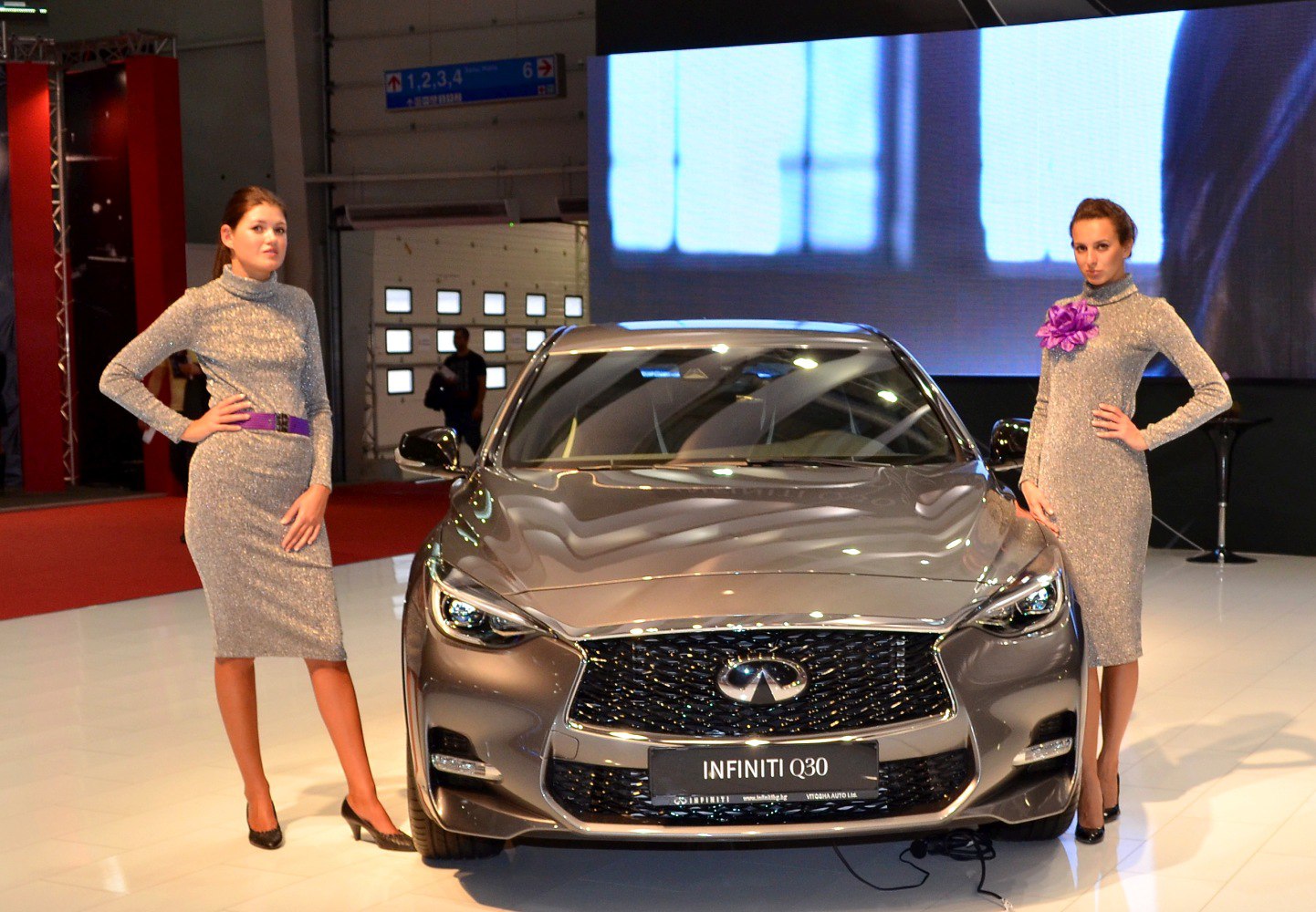 Front view featuring mesh grille and sleek headlights