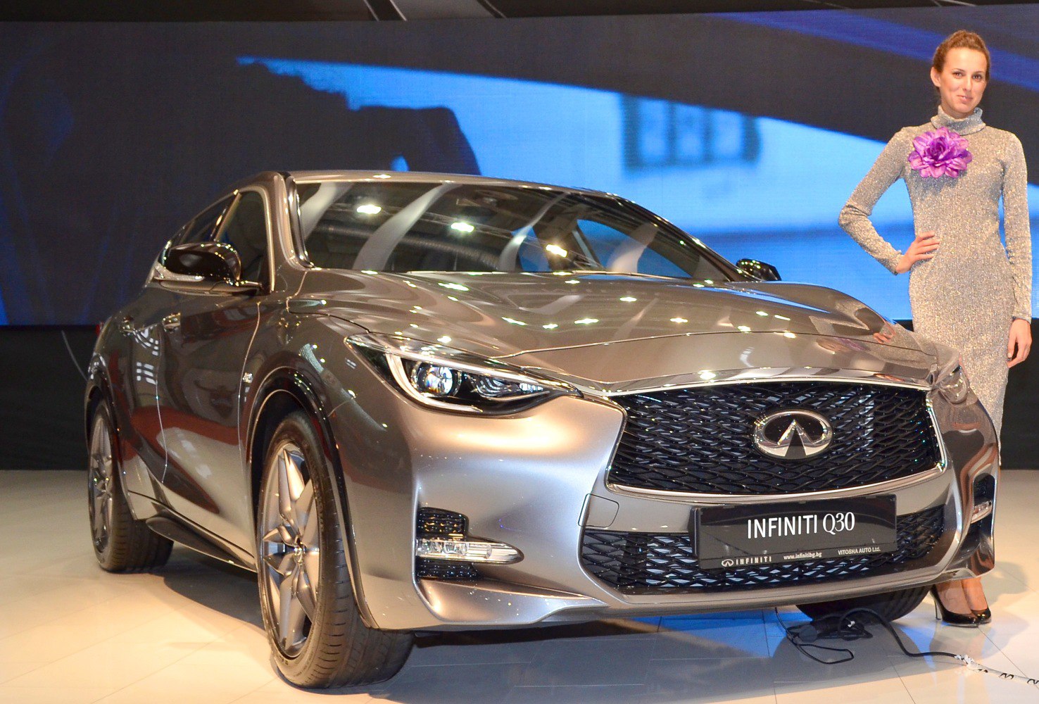 Front view of Infiniti Q30 with signature grille and sharp headlights