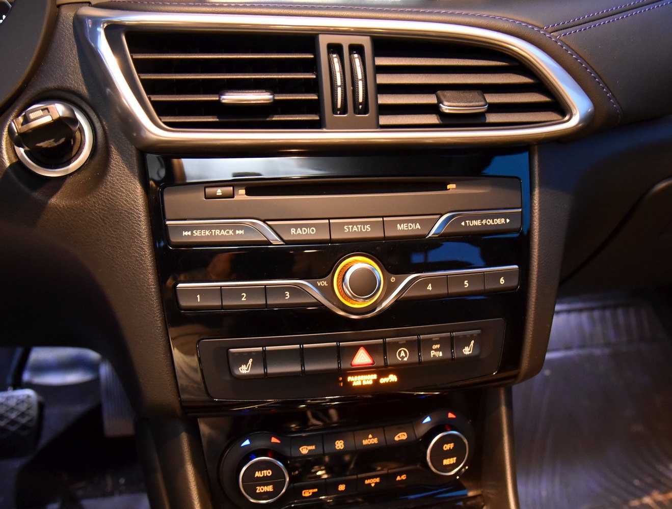 Dashboard air vents, audio, and climate control buttons