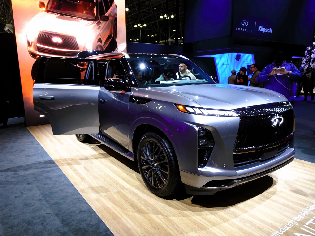 Aggressive front grille and slim LED headlights on large SUV