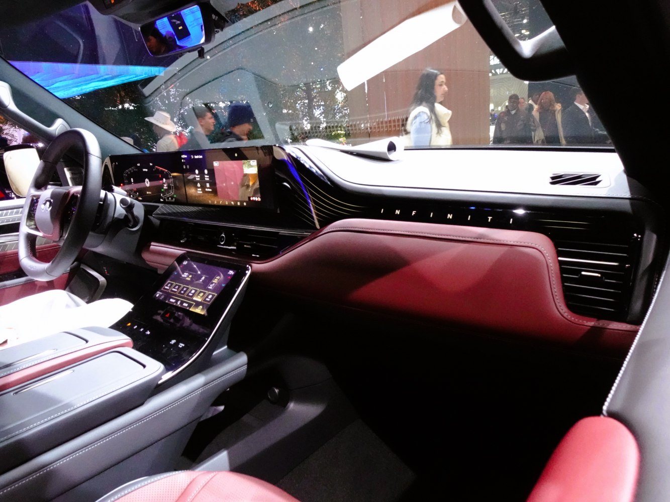 Luxury SUV interior with digital cluster and touchscreen infotainment