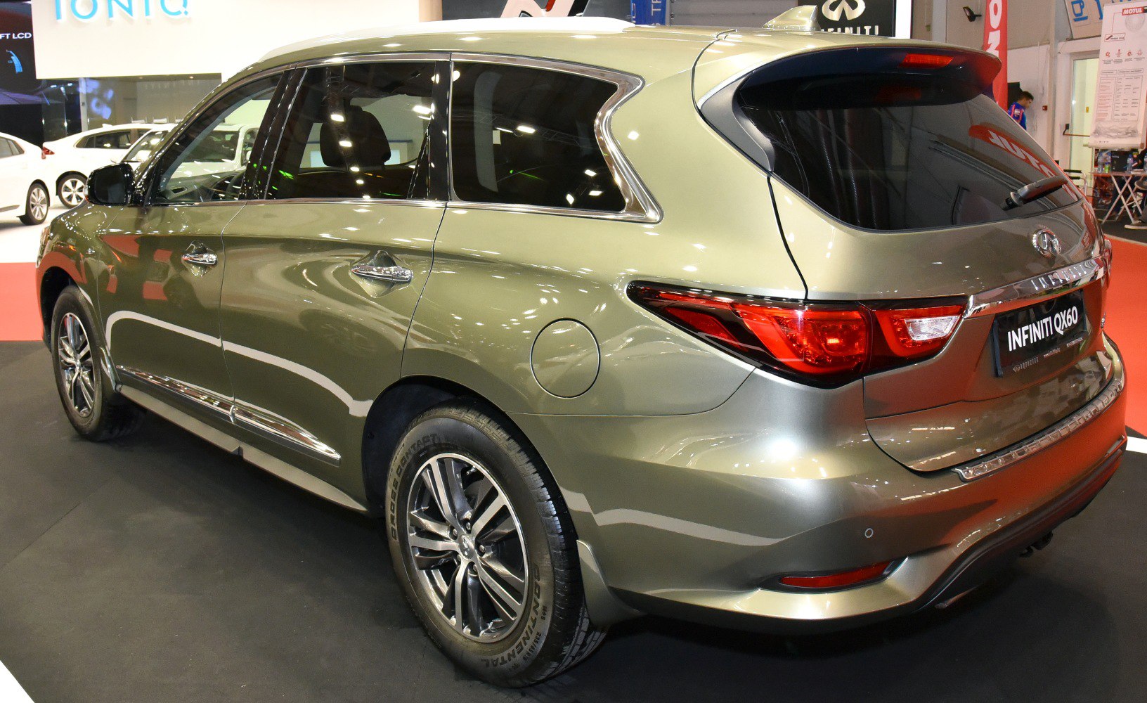 Rear and side view of a luxury SUV with modern taillights and chrome trim