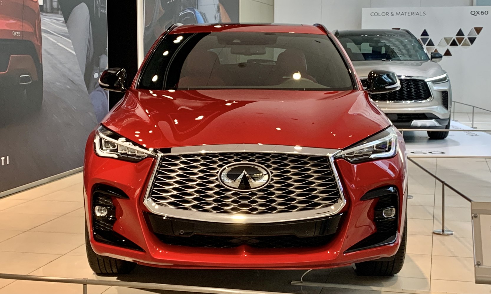 Large chrome grille and sleek LED headlights front view