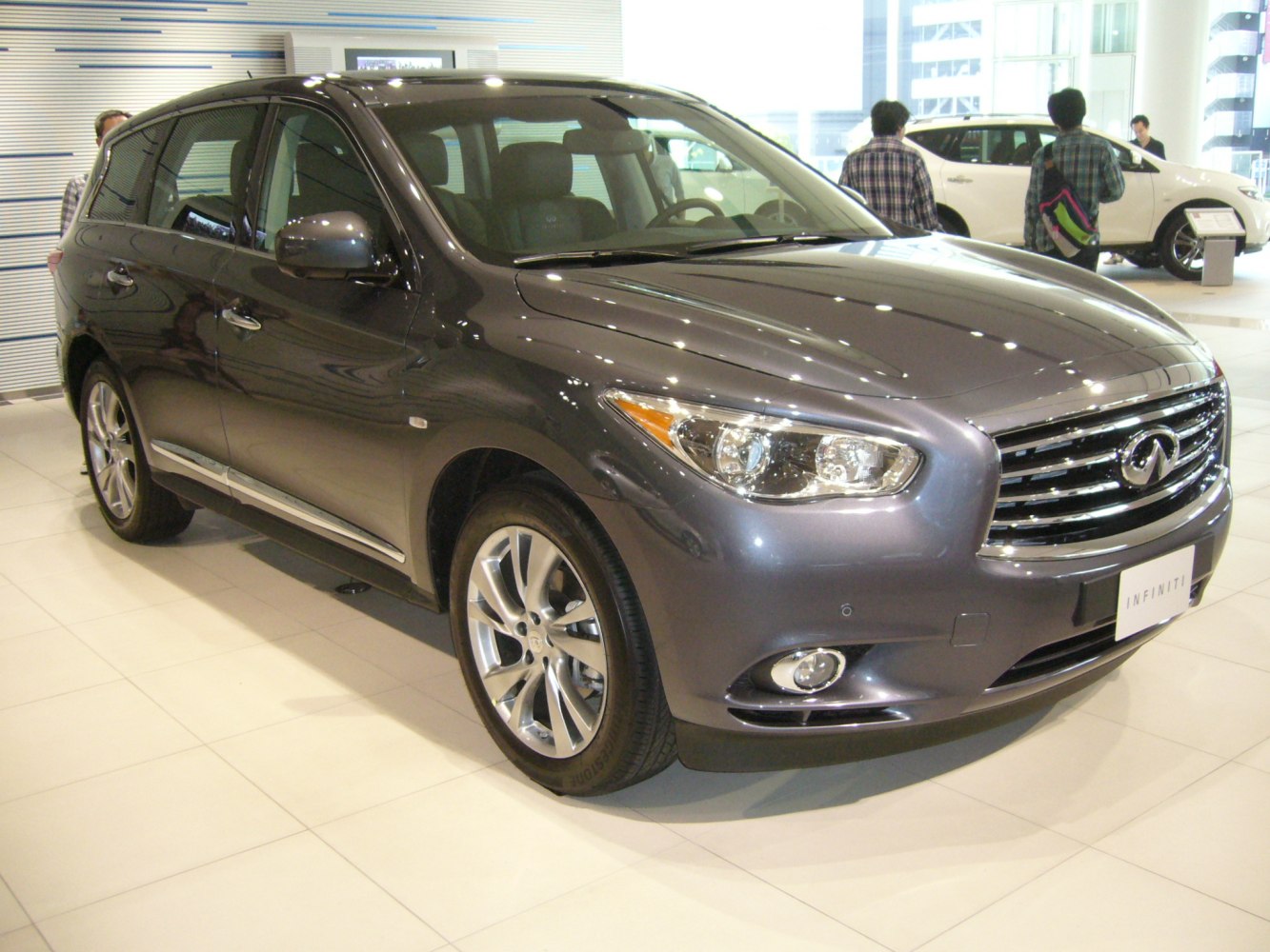 Front three-quarter view of a luxury SUV with alloy wheels