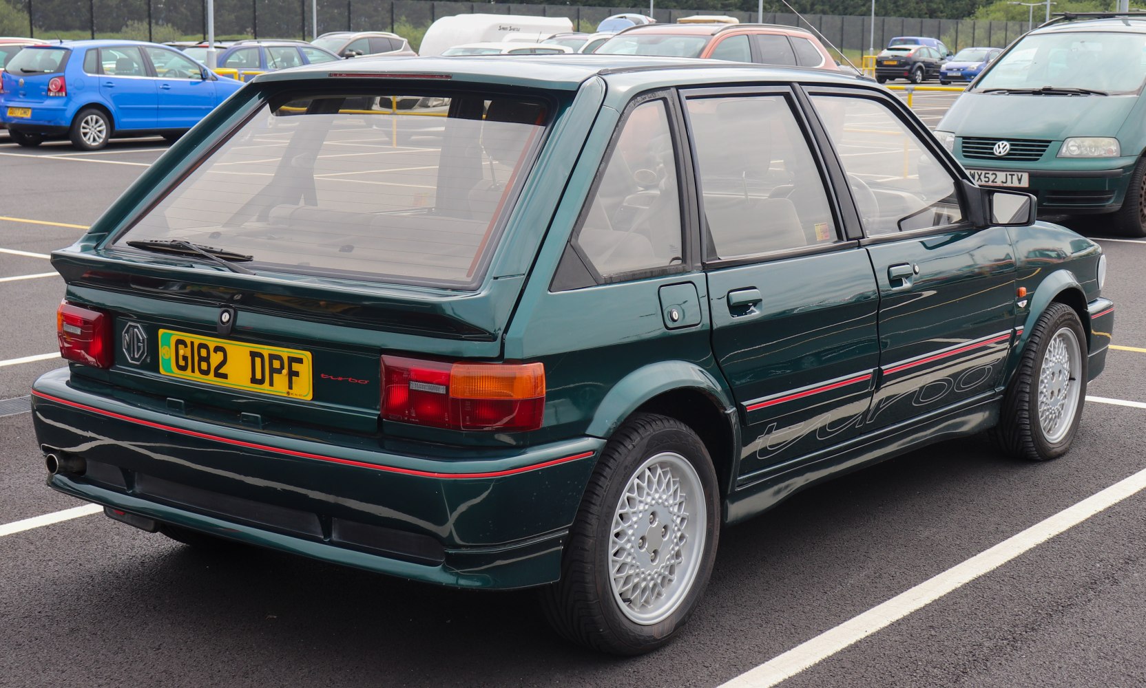 1980s hatchback with turbo side decal and mesh alloy wheels