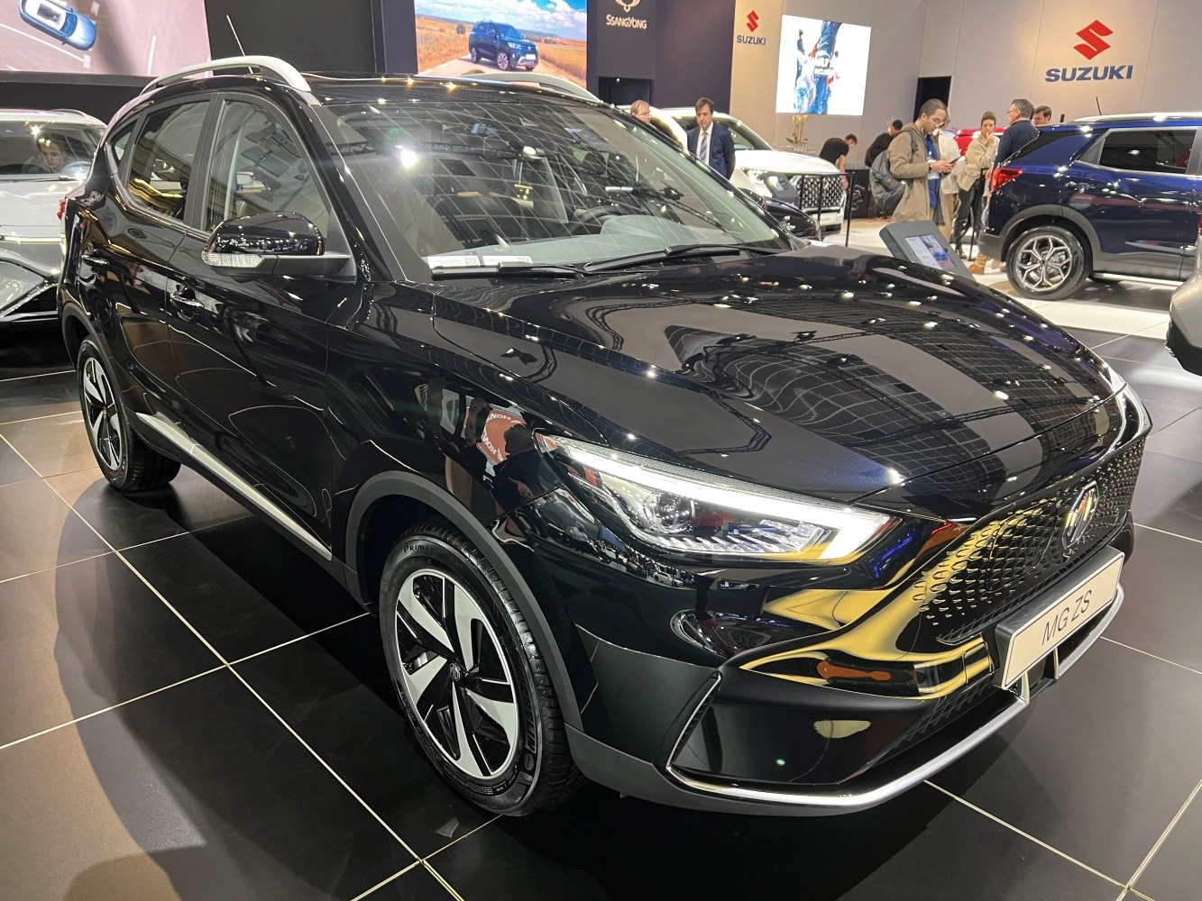 Black electric crossover with LED headlights and distinctive alloy wheels