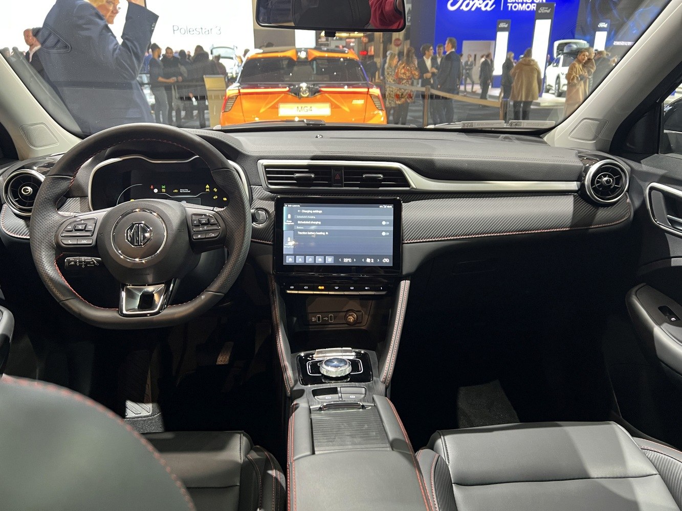 Touchscreen dashboard and multifunction steering wheel in electric vehicle