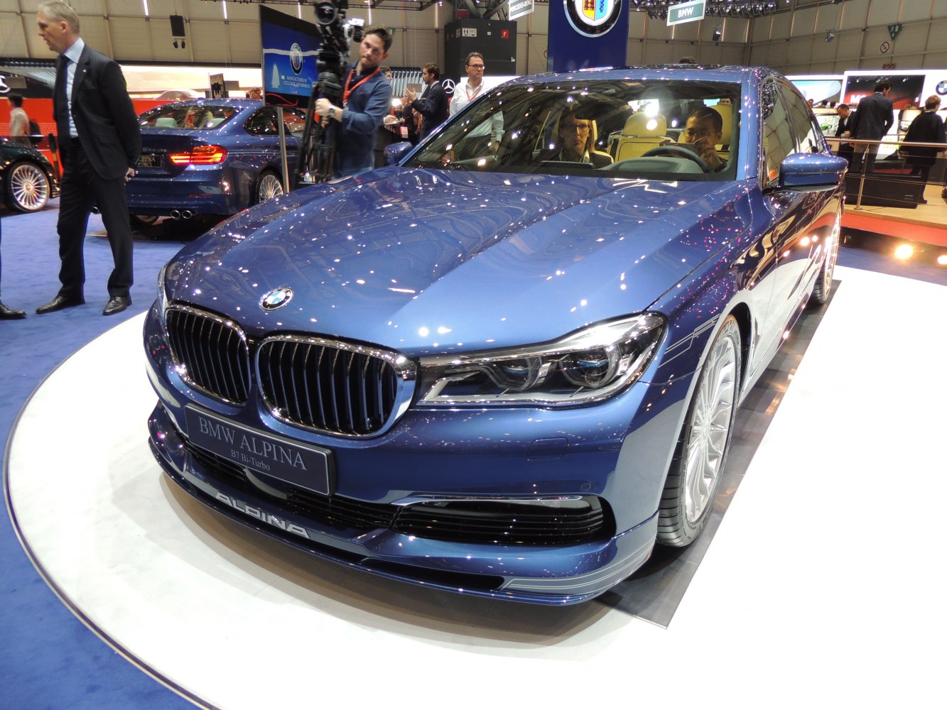 Front close-up of luxury sedan with kidney grille and LED headlights