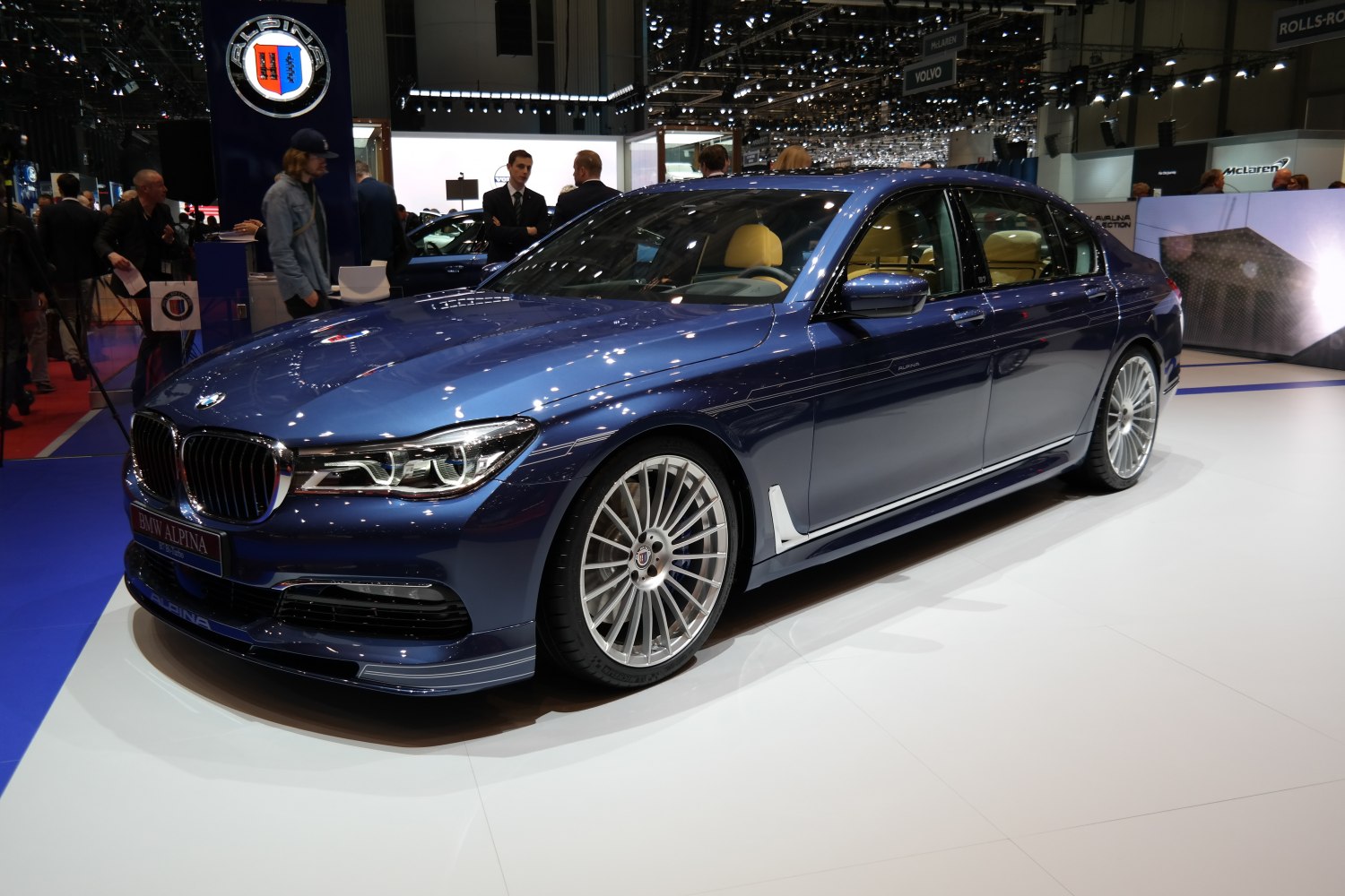Luxury sedan with multi-spoke alloy wheels and LED headlights