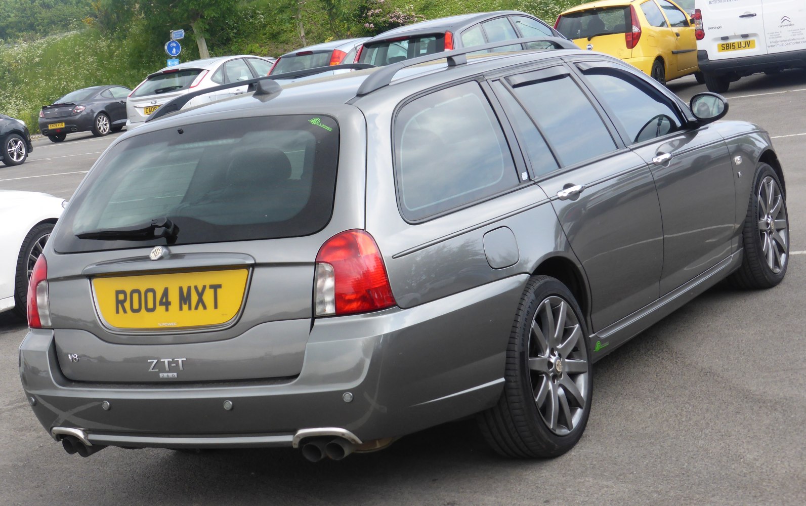 Rear side view of estate with V8 and dual exhausts