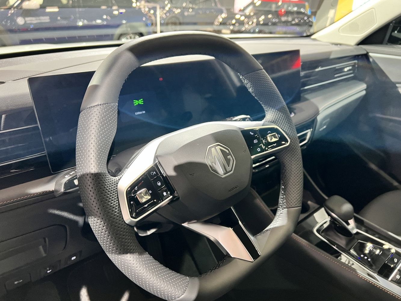 Modern steering wheel and digital dashboard with control buttons