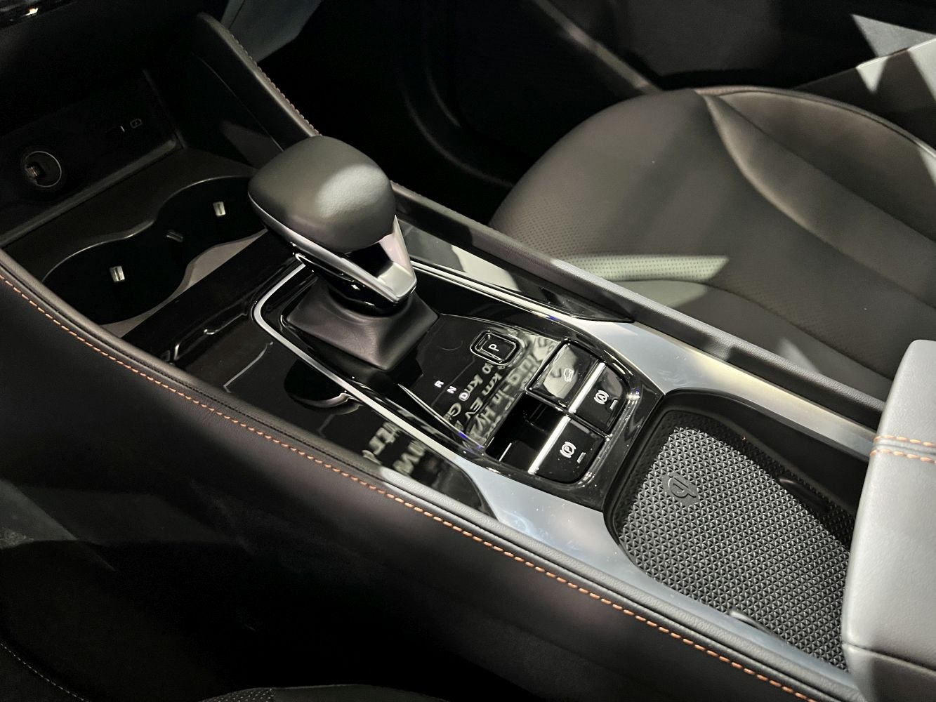 Modern gear shift console with electronic parking brake and cup holder