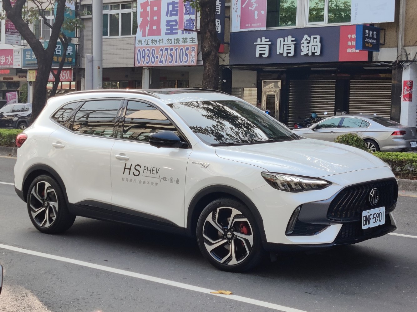White SUV with LED headlights and sporty alloy wheels
