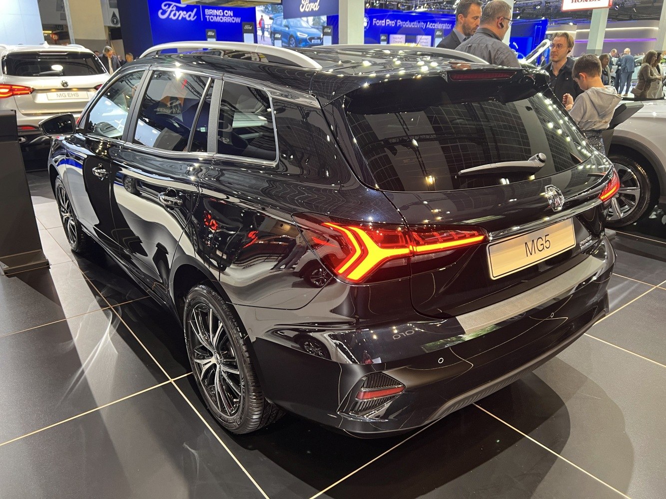 Sleek rear view with LED tail lights and alloy wheels