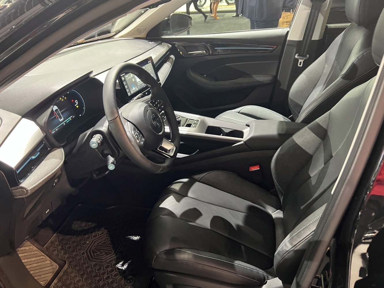 Modern car interior with digital dashboard and multifunction steering wheel