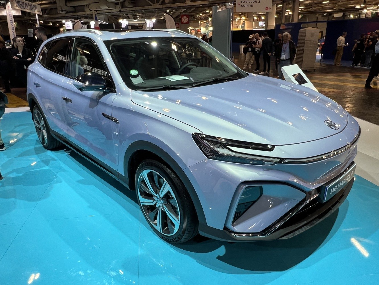 Front and side view of modern electric SUV with LED headlights
