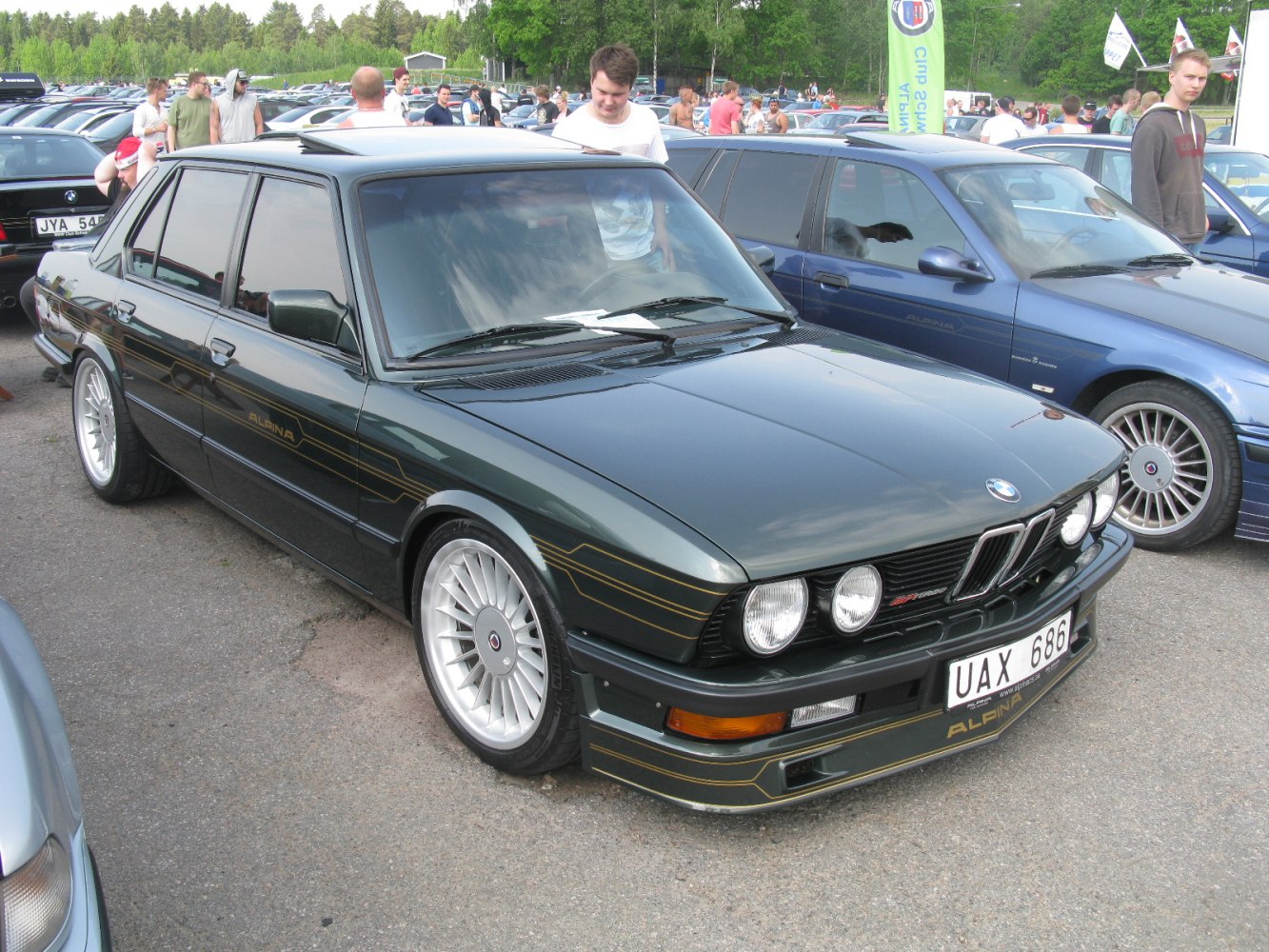 Classic sedan with multi-spoke wheels and sporty front spoiler
