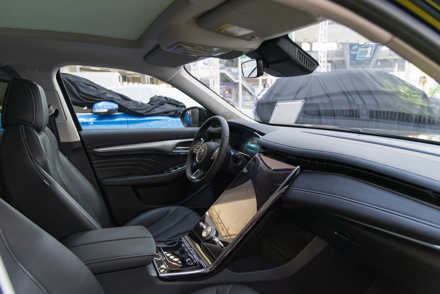 Digital dashboard and large touchscreen console in modern car interior