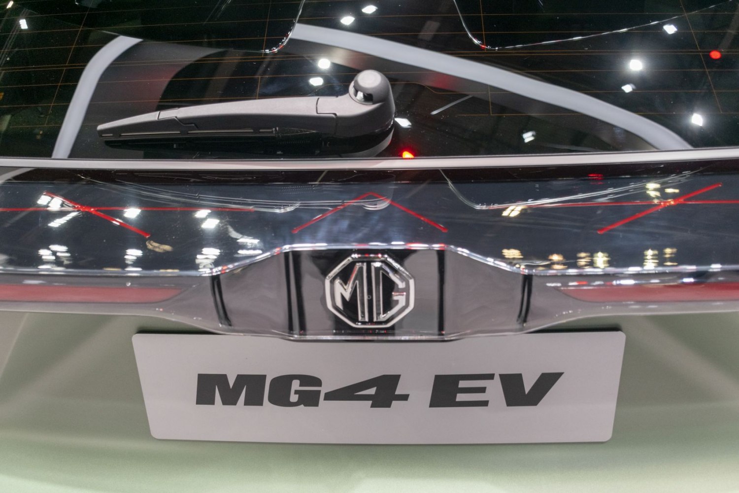 Rear MG badge and rear window wiper close-up on a modern electric vehicle
