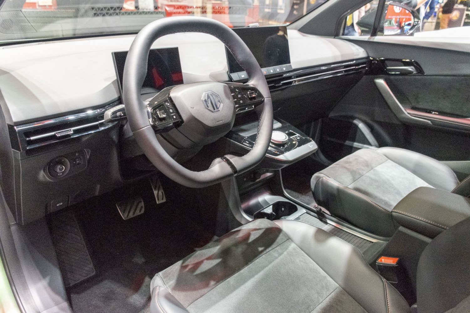 Modern dashboard and multifunctional steering wheel with digital displays and control buttons