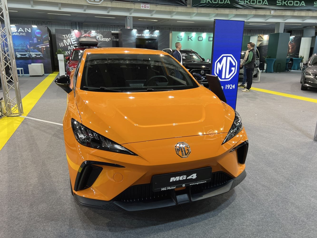 Front view with sharp LED headlights and bold grille design