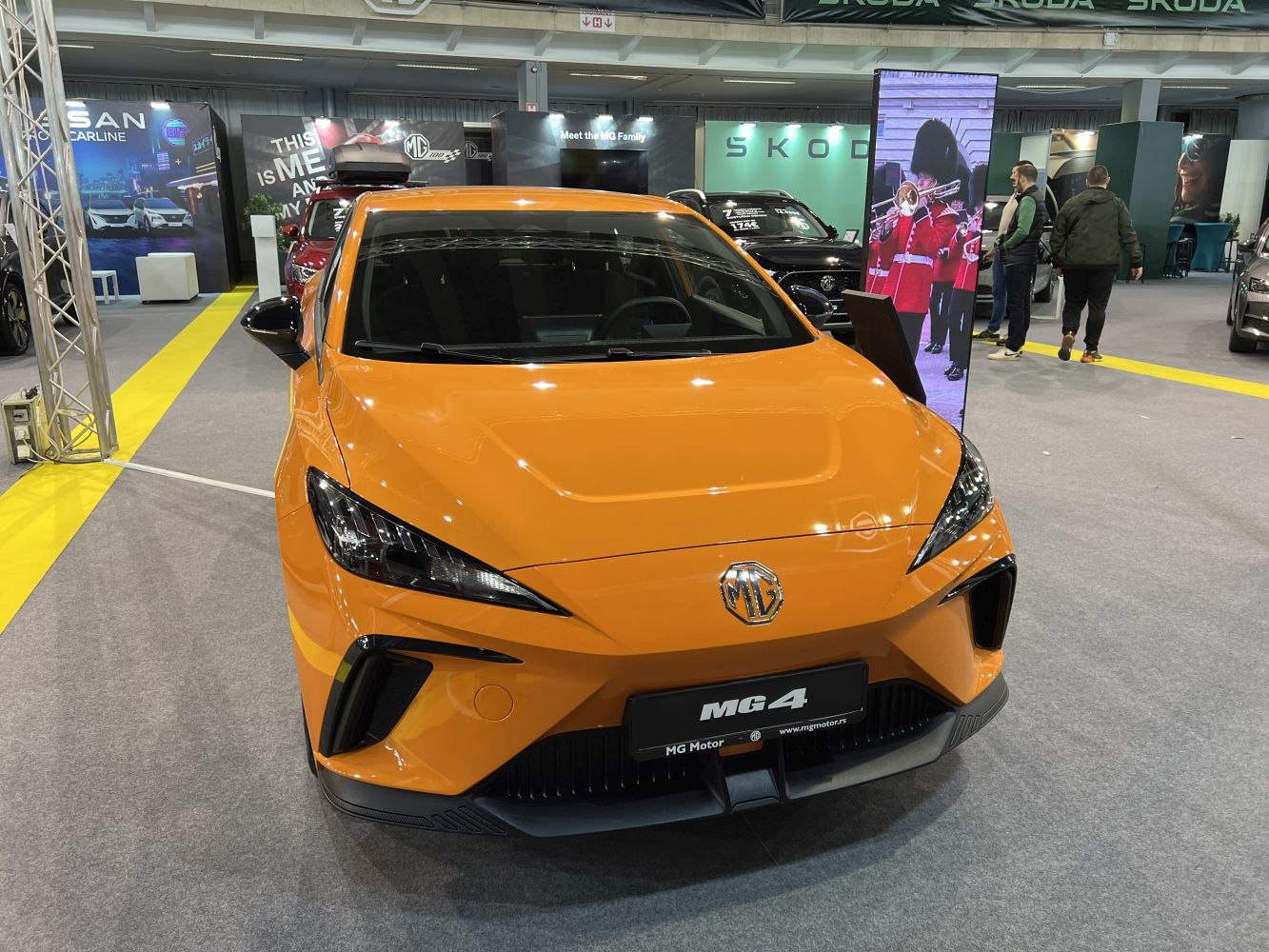 Front view with sharp LED headlights and aerodynamic design.