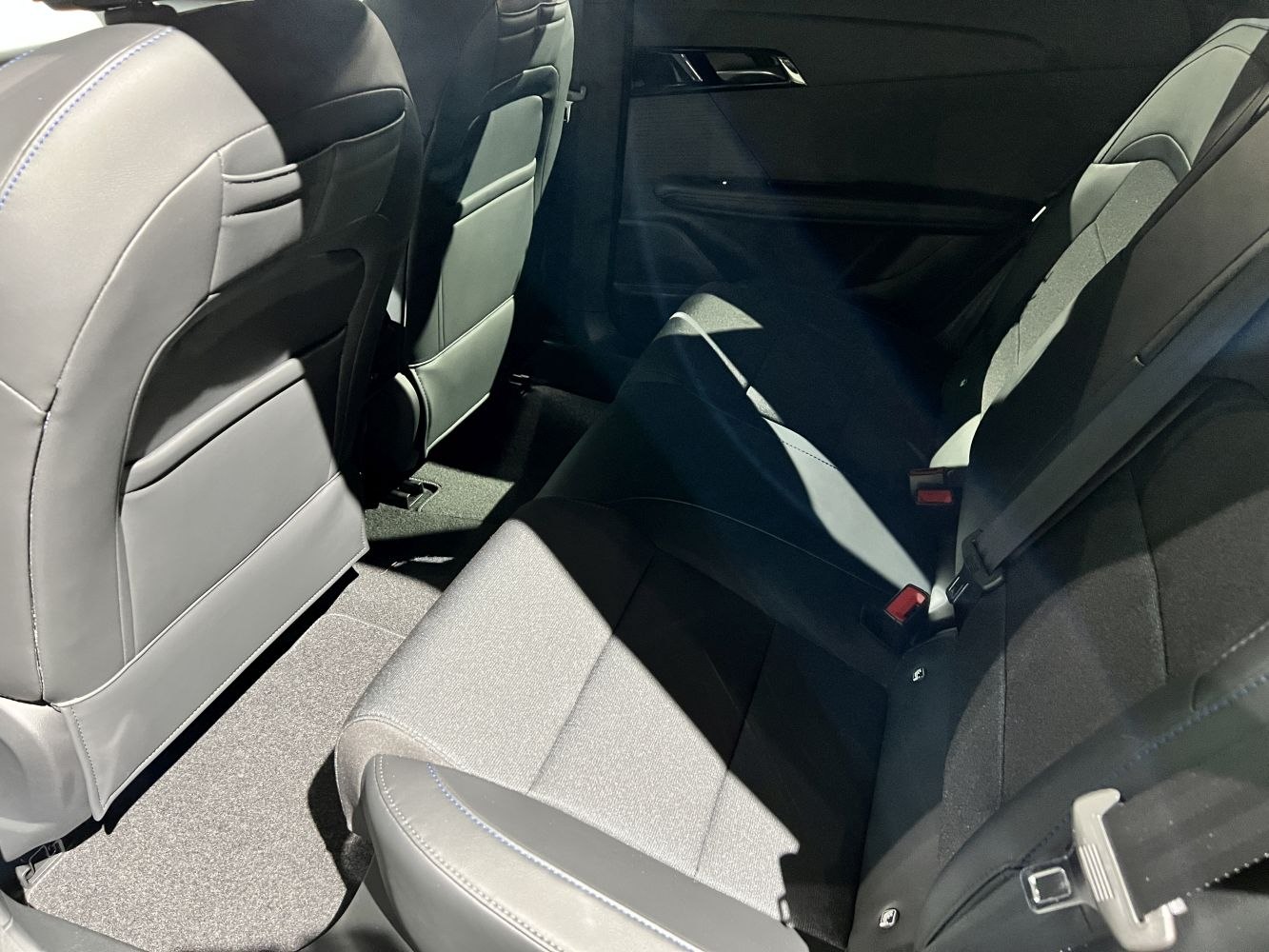 Rear seating area with fabric upholstery and spacious legroom
